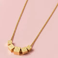 AURIC CUBE NECKLACE