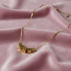 AURIC CUBE NECKLACE